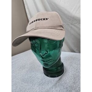 beige cotton baseball cap features "STARBUCKS" embroidered in black
